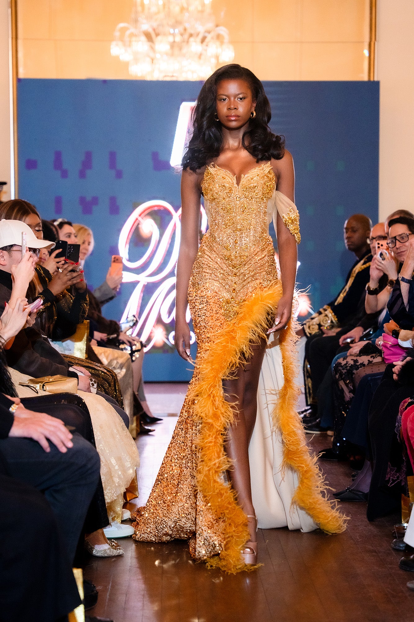 The Golden Siren Feather Gown